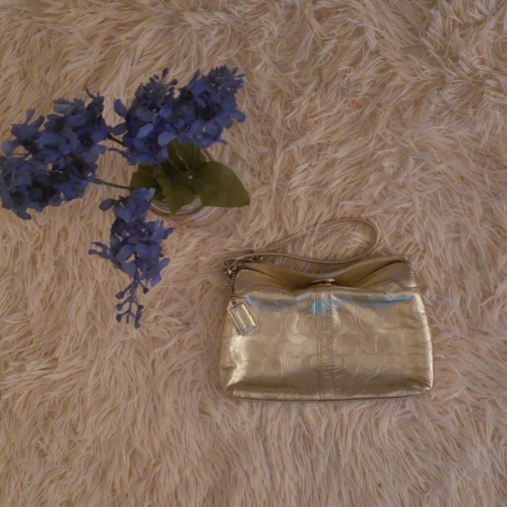 Coach Embossed C Wristlet